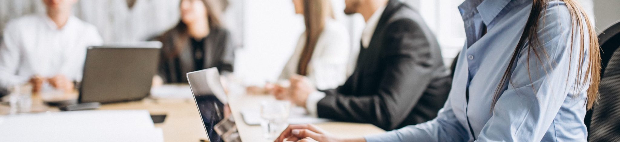 Group of people working out business plan in an office